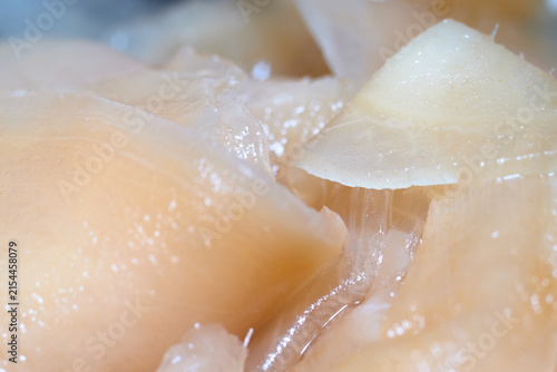 Obraz na płótnie Macro close-up shot of thin slices of pickled ginger root in a pile