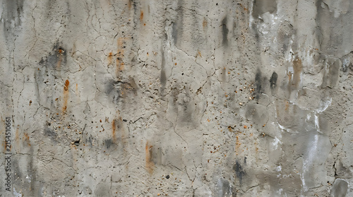 Weathered concrete wall texture, industrial gray cement background with rust stains, aged urban stone surface for architectural design