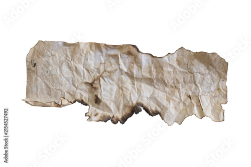 Photography A crumpled, aged piece of paper with burnt edges lies on a white background, symbolizing decay and forgotten history