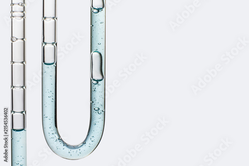 Macro Shot of U-Shaped Glass Tube with Blue Cosmetic Gel
