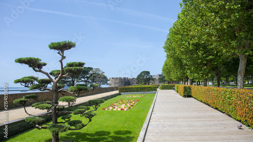 Pine trees and landscaped gardens at Cours Dajot overlooking Brest bay Brittany France 