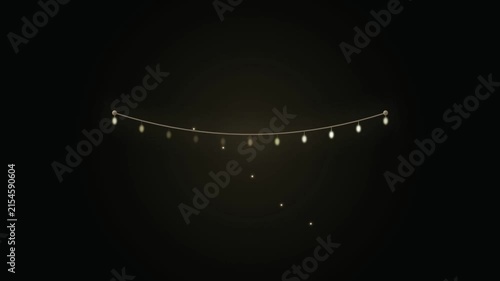 A string of glowing fairy lights suspended against a dark background.