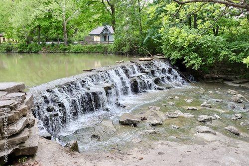 The peaceful waterfall in the woods.