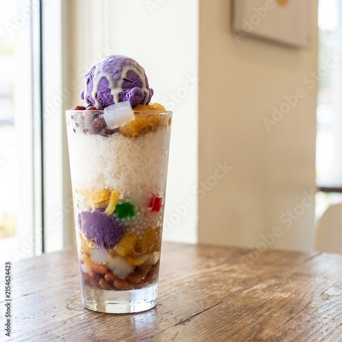 Traditional filipino halo-halo dessert with ube ice cream and mixed ingredients