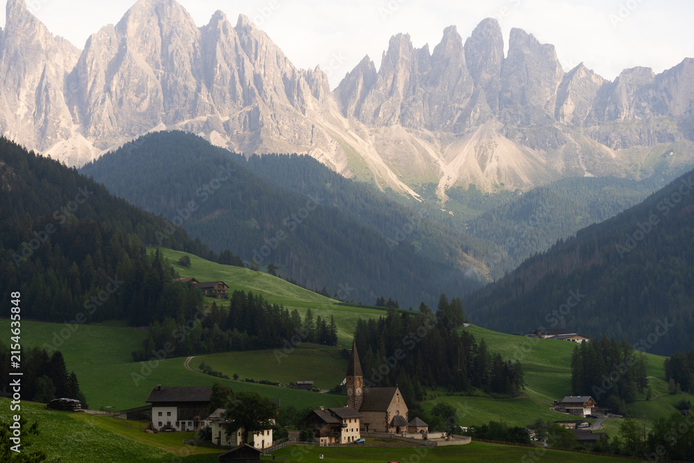 Obraz premium View of Val di Funes with the Chruch of Santa Maddalena in the Dolomites Mountains. Italy