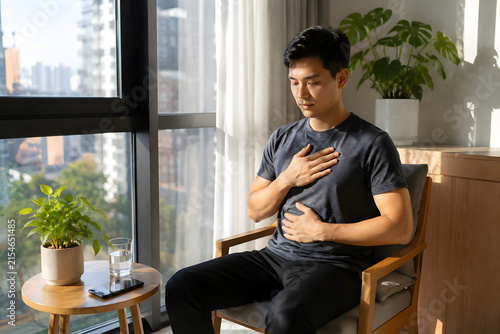 Man experiencing indigestion at home