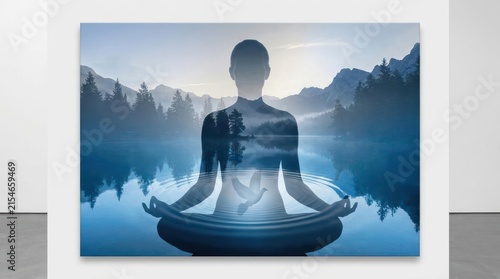 Double exposure silhouette of woman meditating over mountain lake.