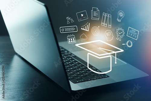 Obraz na plátně E learning with a laptop and digital icons representing education in a study spa
