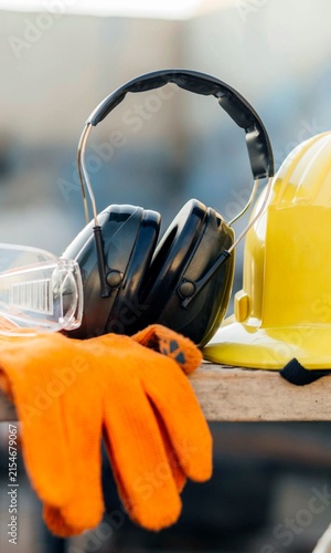 Protective Gloves and Safety Goggles Isolated on White Background for Construction Work and Industrial Safety Equipment
