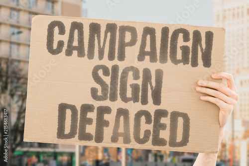 Картината върху платно "Campaign Sign Defaced" A campaign sign is defaced with graffiti