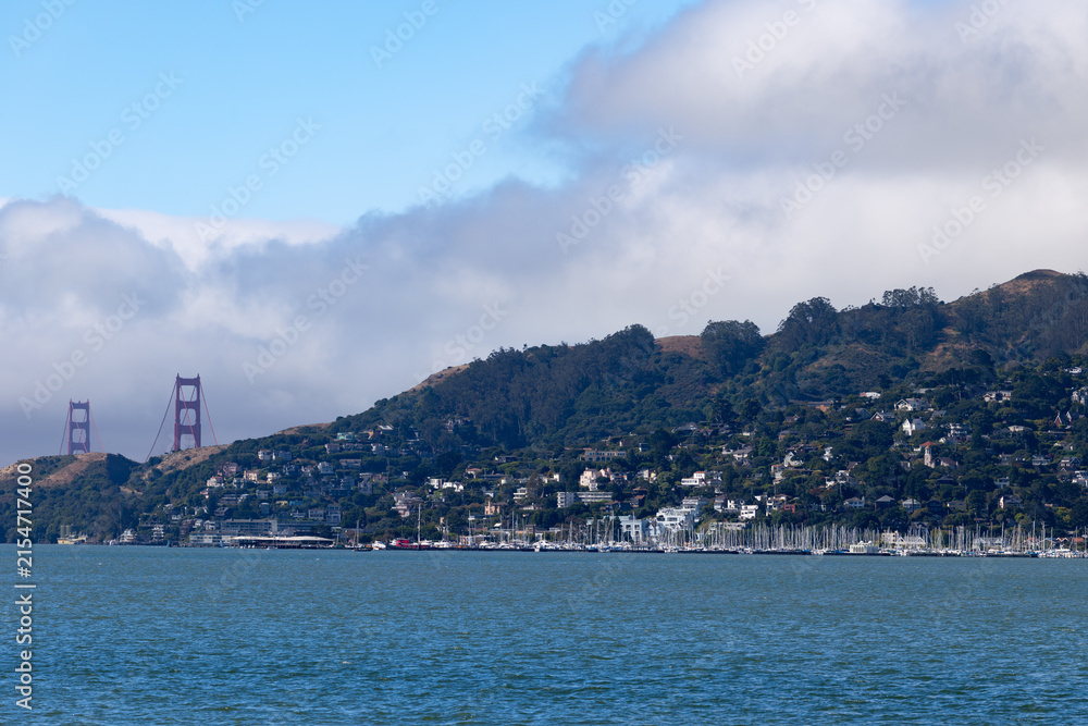 Fototapeta premium View from Belvedere across San Francisco Bay to Sausalito Golden Gate Bridge towers and marina