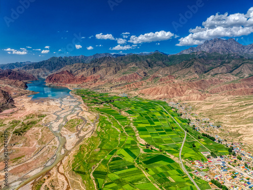 Aerial View of Mountain Village and Farmland in Qilian Mountain National Park, China