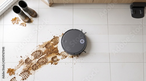 A robot vacuum cleaner navigating over muddy footprints on floor tiles for smart home appliance advertising and cleaning hacks.