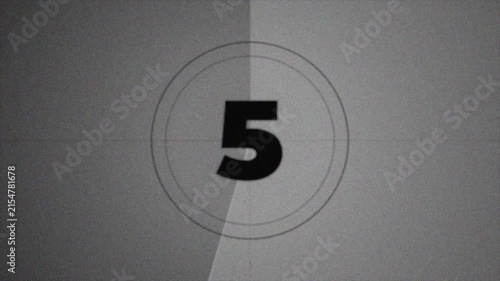 Vintage film countdown leader with number from 10 to 0 seconds, aged textures, defocused film look, flicker, grain and scratches effect, classic reel markings for retro video overlays, 4K video