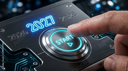 Finger pressing a glowing start button on a futuristic metal panel with the year 2027 displayed