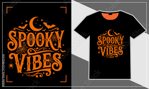 Black t-shirt with spooky orange halloween vibes text design featuring a crescent moon