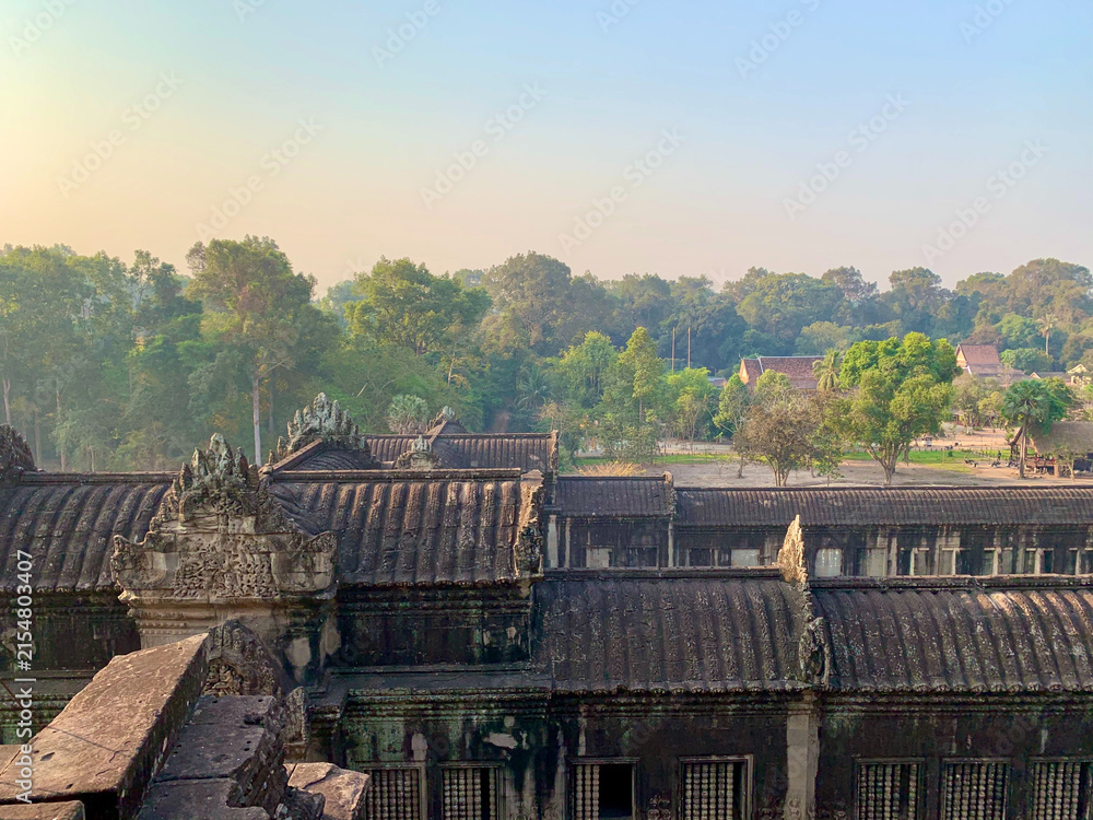 Fototapeta premium Siem Reap, Cambodia - February 20, 2020: Tiered rooftops of Angkor Wat temple