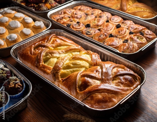 various pies in metal pans