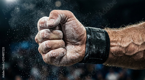 Obraz na płótnie Athlete's Chalked Fist, Wrist Wrap, Power, Grit, Determination Close-Up