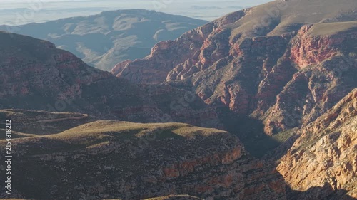 Aerial of winding dirt road mountain pass, Swartberg pass, South Africa