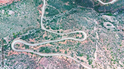 Aerial of winding dirt road mountain pass, Swartberg pass, South Africa