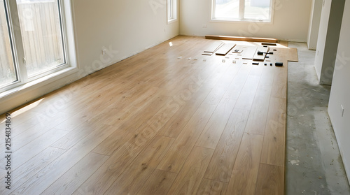DIY laminate flooring installation guide | laying light oak wood planks on concrete | home renovation floor remodeling project | modern interior design wood floor upgrade