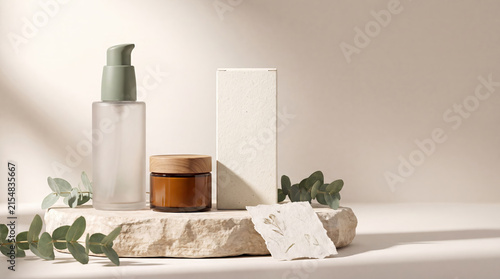 Skincare products displayed on natural stone with eucalyptus leaves