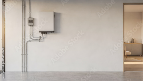 Wall with mounted electrical equipment and conduits with an open doorway to a room