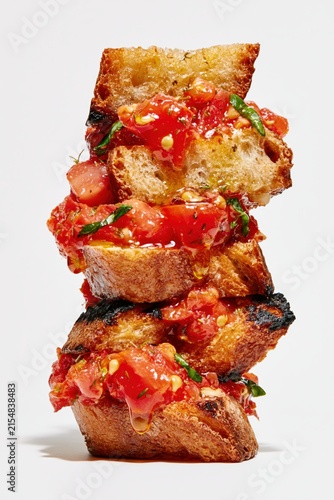 Tomato Bruschetta Close Up Stack on White Background