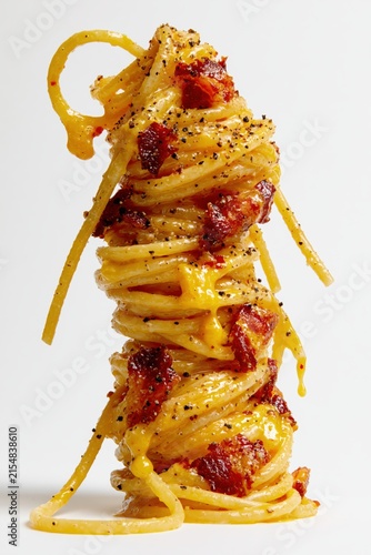 Spaghetti Carbonara Leaning Stack on White Background
