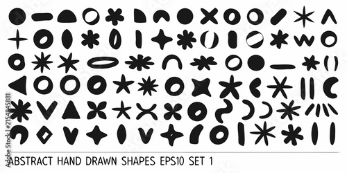 Collection of abstract hand drawn black shapes on a white background
