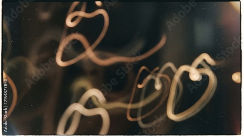 Abstract light trails creating a dynamic and ethereal visual experience with swirling patterns and glowing effects.