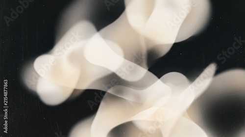 Abstract ethereal forms of light and shadow dance against a dark background, evoking a sense of mystery and fluidity.