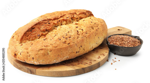 Quadro su tela Loaf of fresh bread with flax seeds isolated on white