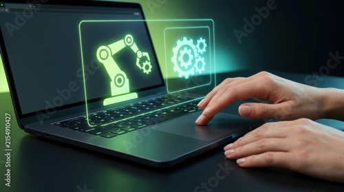 Hand using laptop showing robotic arm design