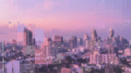 Soft pastel cityscape at dusk with blurred buildings and a colorful sky