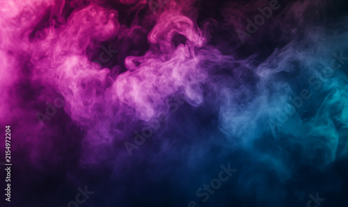 A mesmerizing gradient of pink, purple, and blue smoke swirling majestically against a dark background, creating a mysterious and dramatic atmosphere