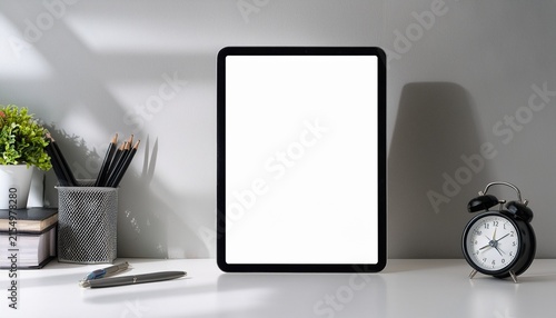 blank tablet mockup on clean white desk