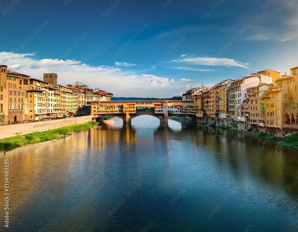 Fototapeta premium panoramic view of medieval stone bridge ponte vecchio over arno river in florence firenze tuscany italy europe florence cityscape architecture and landmark of florence and italy