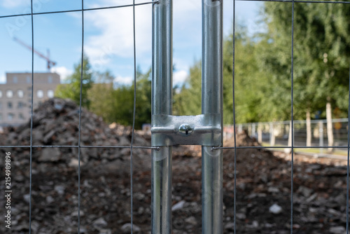 Metal Connector of Temporary Construction Fence at Demolition Site