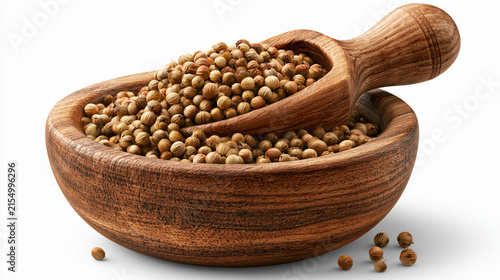 Wooden bowl and scoop filled with coriander seeds isolated on white background