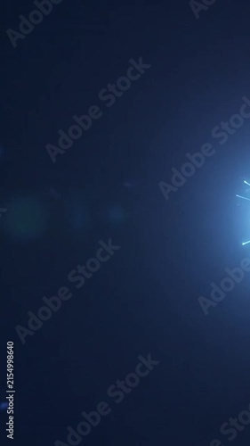 Bright blue glowing light streaks moving across a dark space background