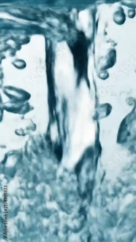 Clear flowing water and splashing bubbles create a refreshing and dynamic liquid background