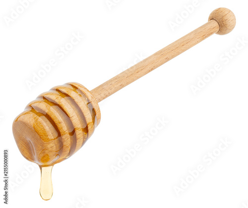 Honey. Wooden honey dipper with dripping honey. Natural sweet honey on traditional wooden drizzler for tea, desserts, breakfast and organic nutrition. Food Photo, photographer. Isolated background