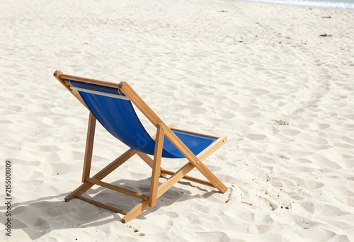 Empty blue wooden beach cha...