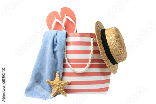 Summer vacation essentials including beach bag flip flops hat towel and starfish isolated on transparent background