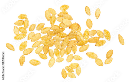 Pile roasted pumpkin seeds with salt isolated on white background, top view