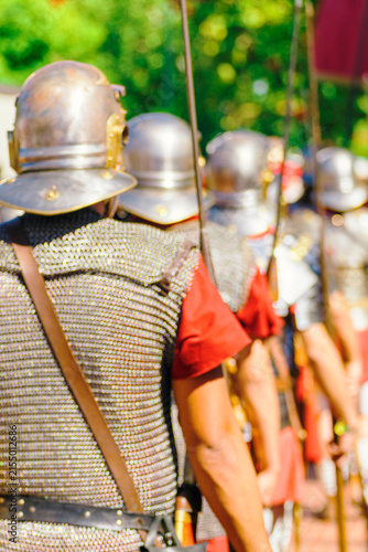 Canvastavla Chaves Roman festival showing a line of marching soldiers The Concept of discipl
