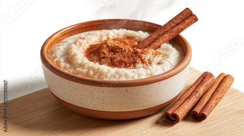 hyper-realistic product photo with food styling of a steaming bowl of rice pudding with ground cinnamon and raw cinnamon sticks in it