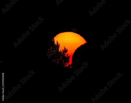 Real image of the partial Solar Eclipse of August 12 2026. Natural Astronomical Phenomenon. Shadow of the Moon and Aura of Solar Corona. 